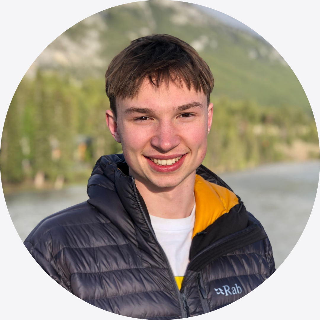Man standing in front of forest